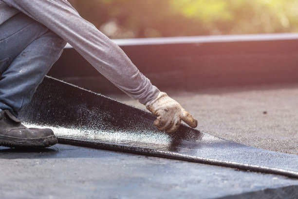 Professional Basement Waterproofing technician working in Long Beach, MD